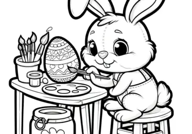 Osterhase bemalt eifrig Ostereier am Tisch: Ausmalbild für Kinder (Gratis)